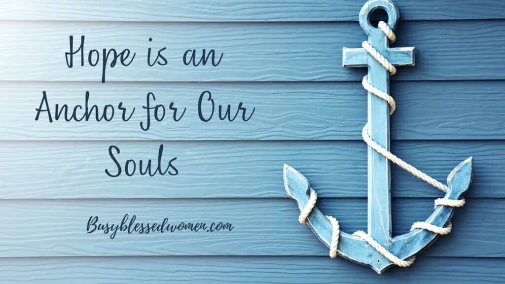 Hope is an Anchor for our Souls- blue painted anchor on right side of page against a background of light blue siding