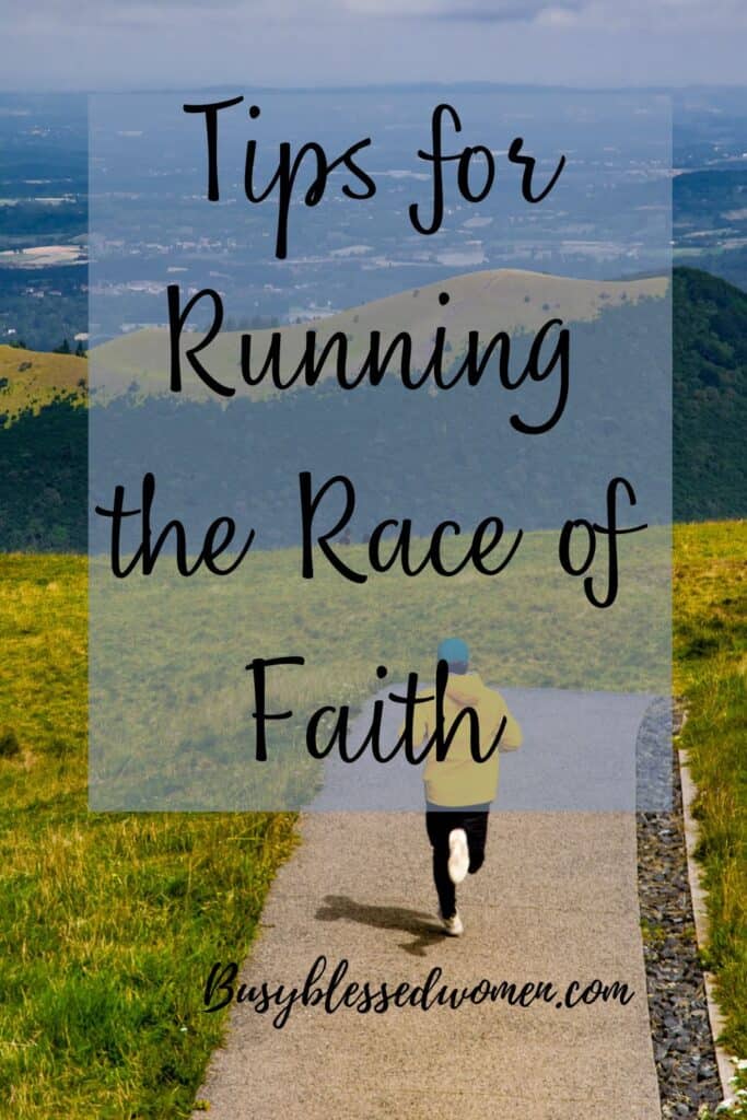 Running the race in the Bible- person in yellow jacket and blue hat running down a concrete trail with mountains in the background.