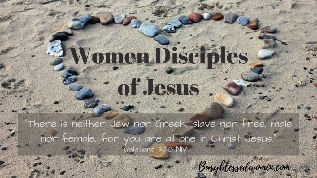 Women Disciples of Jesus- Galatians 3:28 on a backdrop of stones set out in the shape of a heart on beach sand