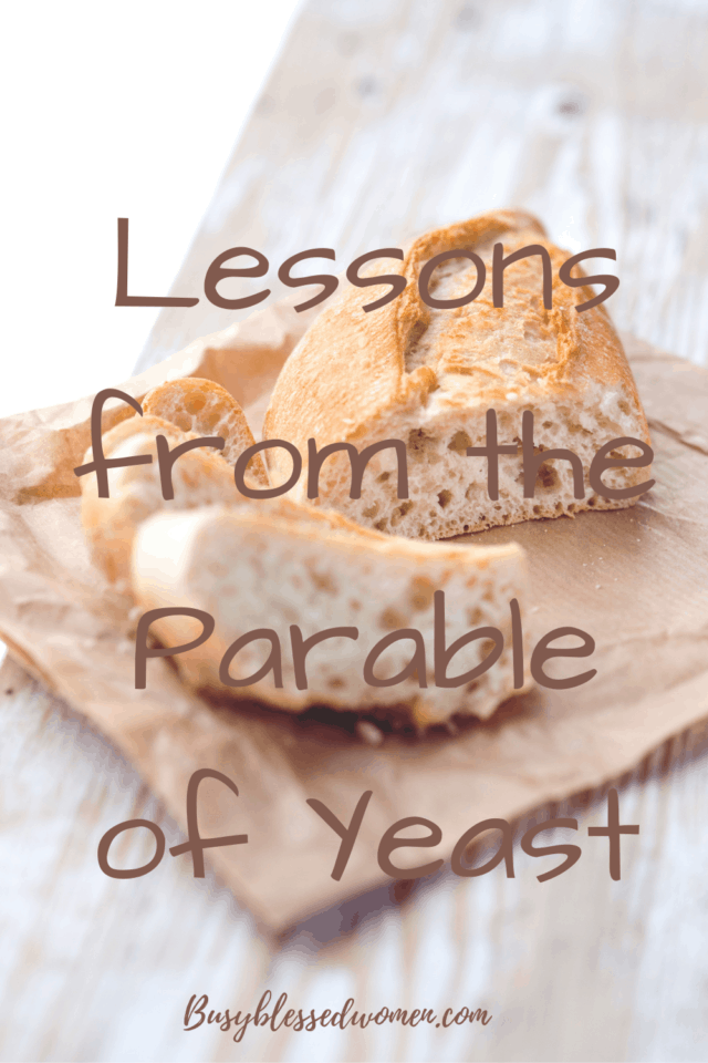lessons from the parable of yeast. Loaf of bread with piece cut off on a piece of paper