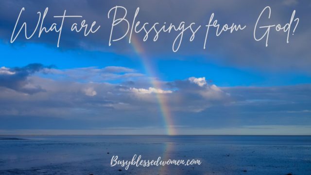 What are blessings from God?- rainbow over water/beach and clouds