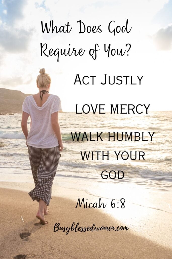 What does the Lord require of you? photo of the back of women in white tshirt and loose dark green capris standing on the beach looking into ocean