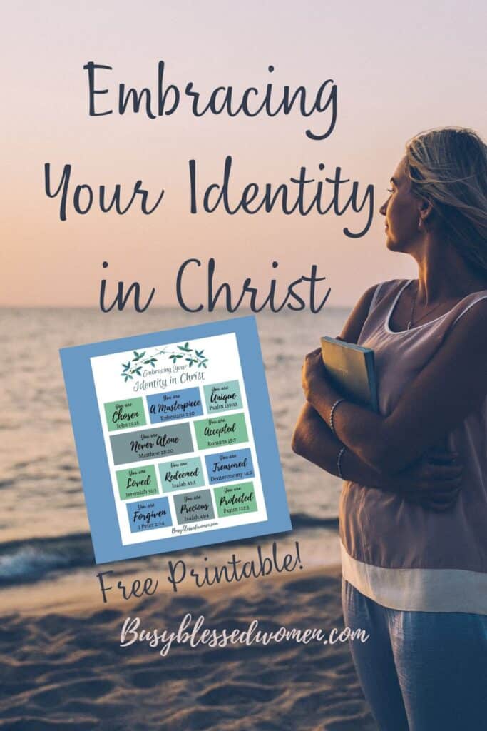 Your Identity in Christ- woman standing on beach holding notebook, looking at water at sunset