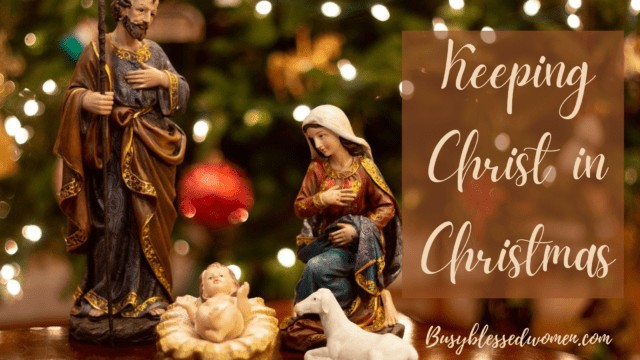 keeping Christ in Christmas- nativity scene with blurred Christmas tree background