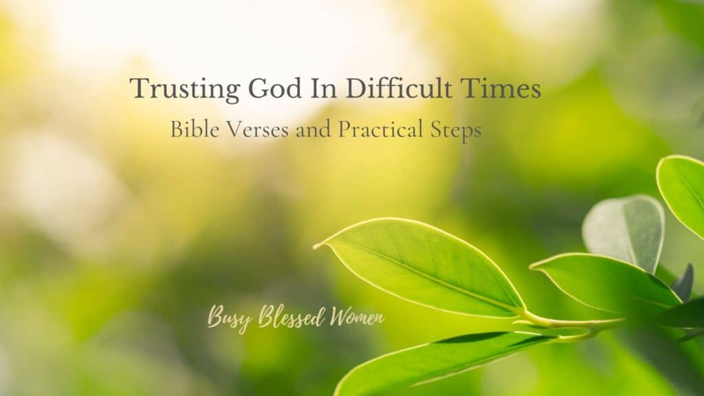 trusting God in Difficult times- blurry background of green, yellow, and white with large green leaflet in lower left