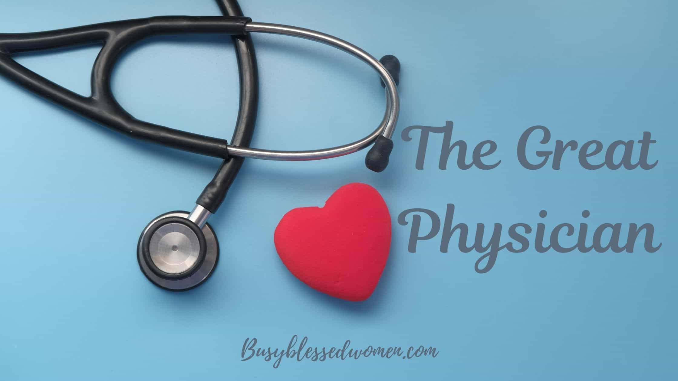 The Great Physician- black stethoscope on light blue background with small red heart