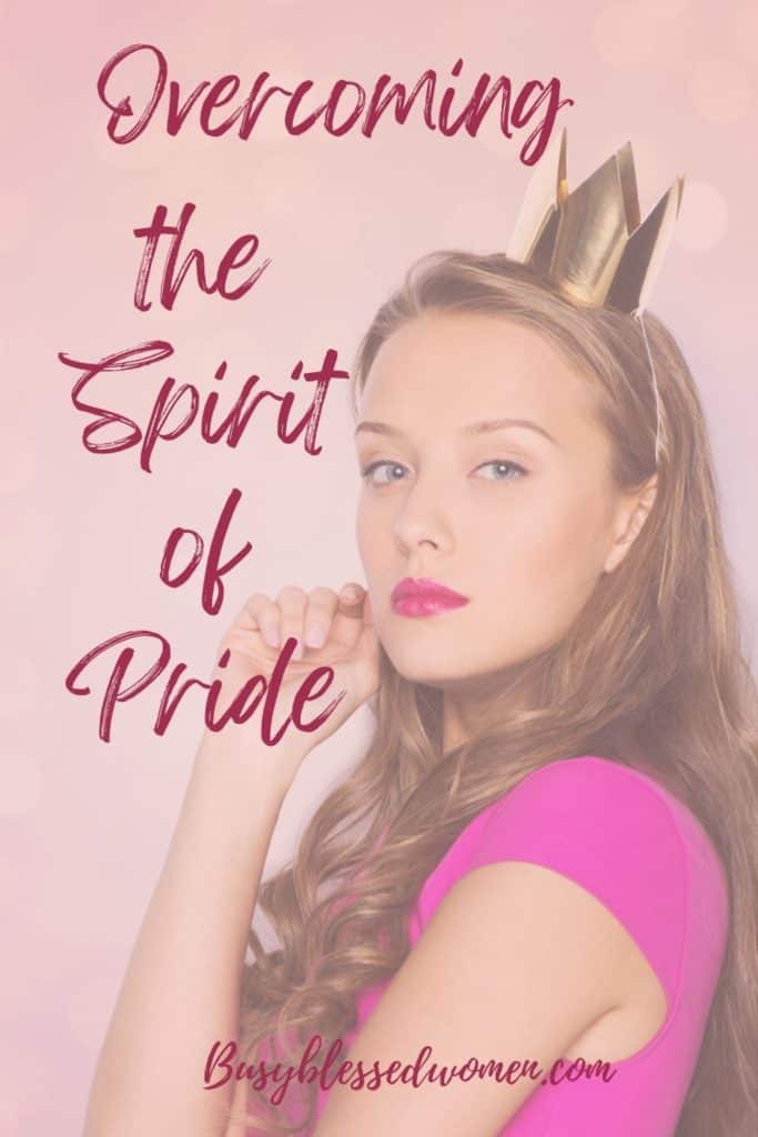 spirit of pride- blonde woman with long hair, wearing a small golden crown and bright pink blouse and lipstick with a haughty look on her face