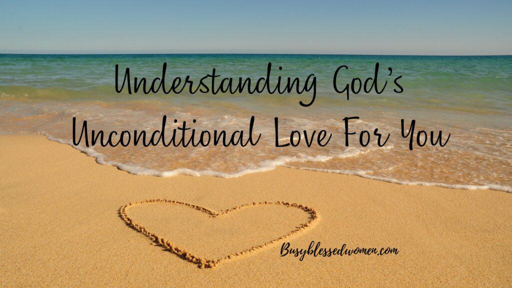 God's Unconditional Love- heart drawn in sand at ocean