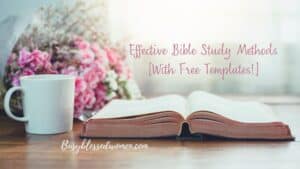Effective Bible Study Methods- open bible on brown table with white coffee cup and bouquet of small pink flowers